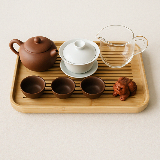 Gongfu tea set with gaiwan, teacups, Yixing teapot and bamboo tray